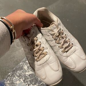 White Athletic Sneakers with Low-Top Design and Textured Surface cheer sneakers